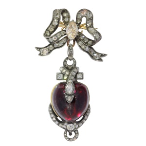 Symbolic Love: Victorian Garnet Heart with Diamond-Encrusted Bow Pendant